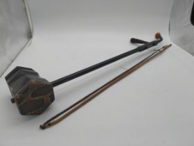 Xinghai Chinese violin and bow. {82 cm L x 13 cm W x 10 cm D}.