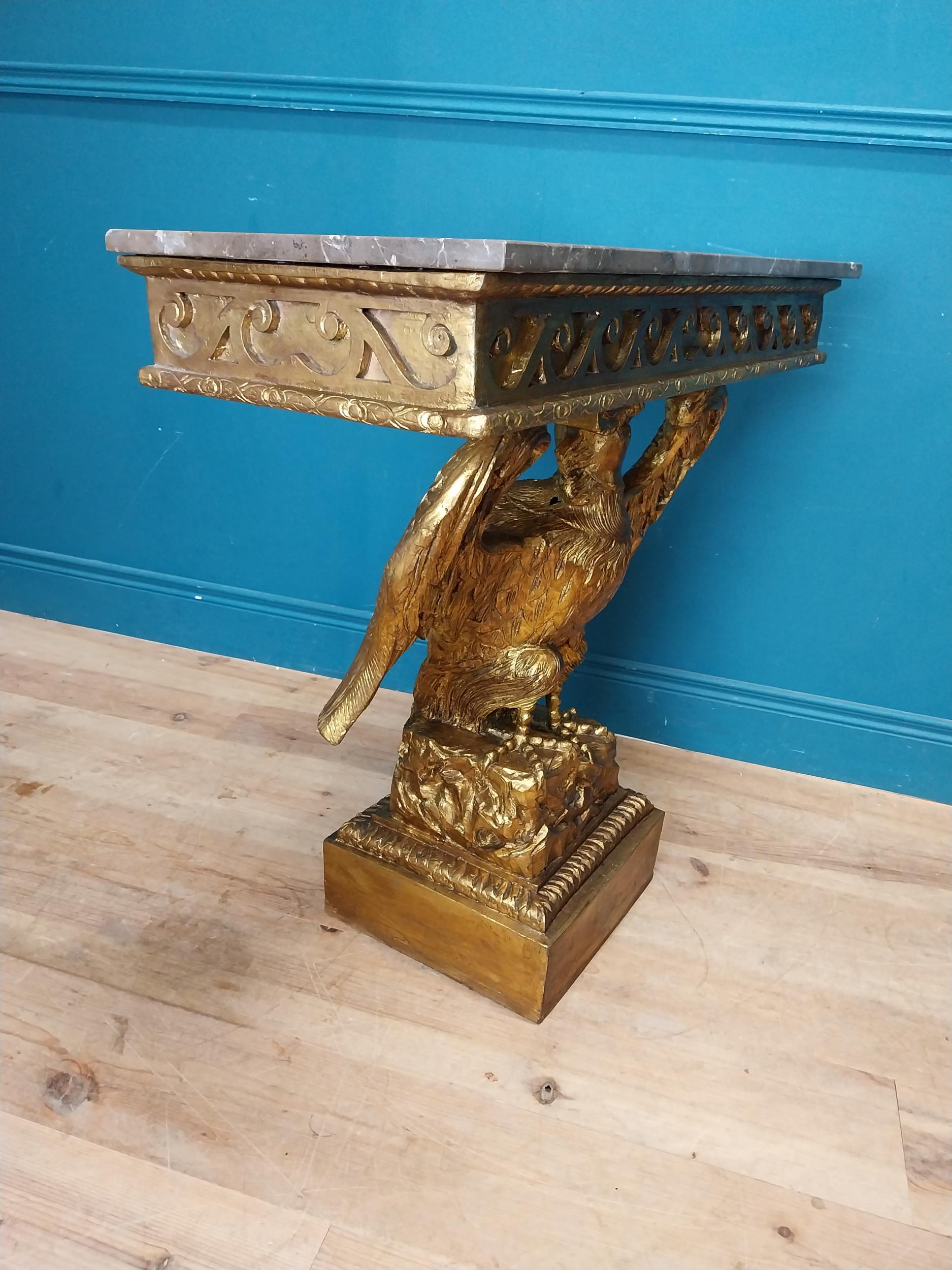 Pair of gilt cast metal marble topped console tables with outspread eagles on base in the William - Image 7 of 8