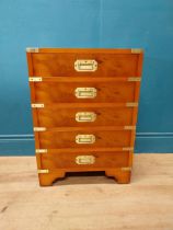 Good quality yew with chest of drawers with brass handles and five drawers raised on bracket feet in