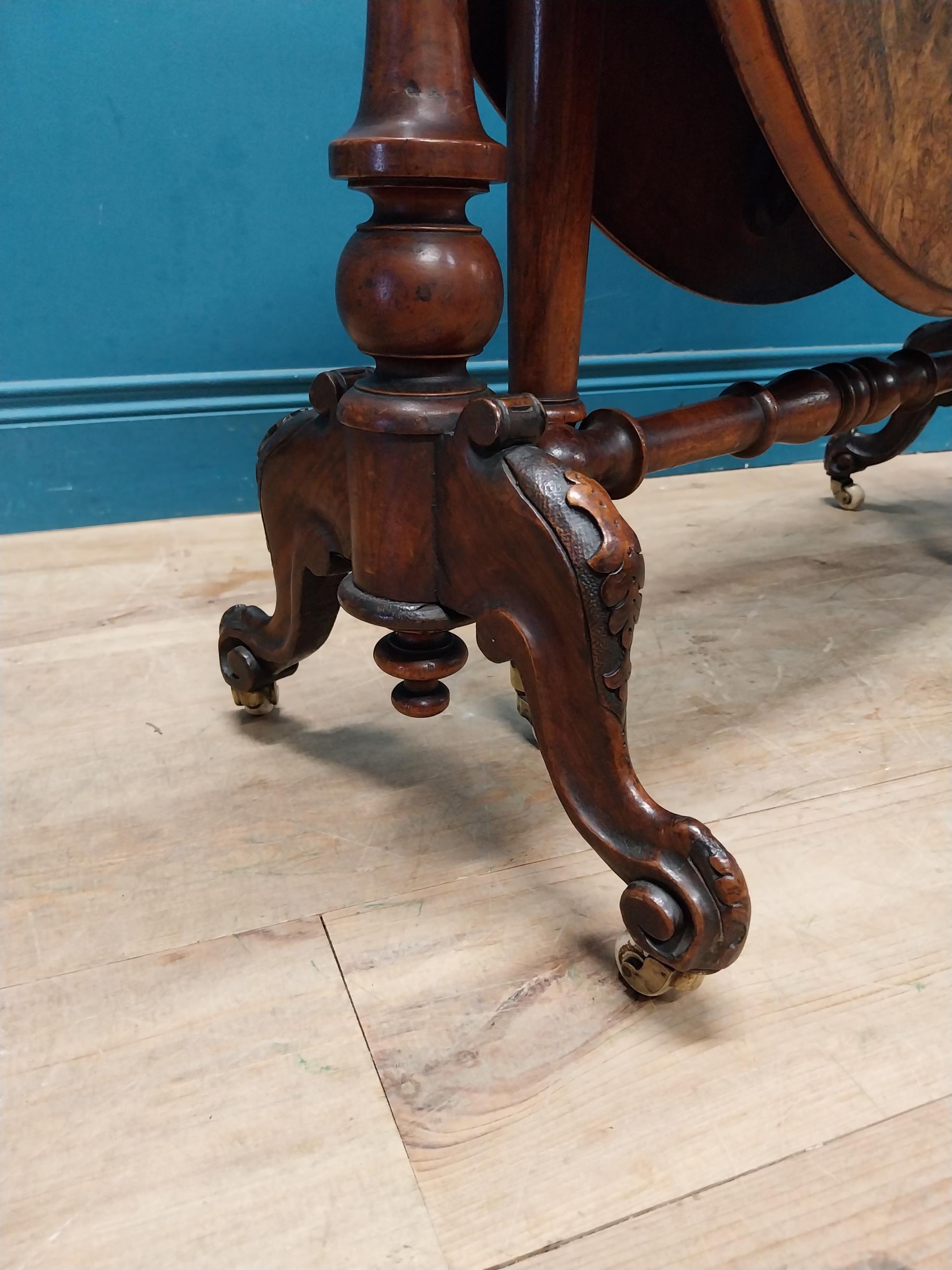 19th C. burr walnut Sutherland table with turned legs raised on arched feet with castors. {73 cm H x - Image 2 of 7