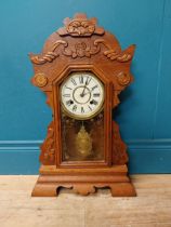 Early 20th C. oak gingerbread clock. {60 cm H x 37 cm W x 14 cm D}.