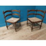 Pair of early 20th C. walnut corner chairs with rush seats {73 cm H x 60 cm W x 42 cm D}.