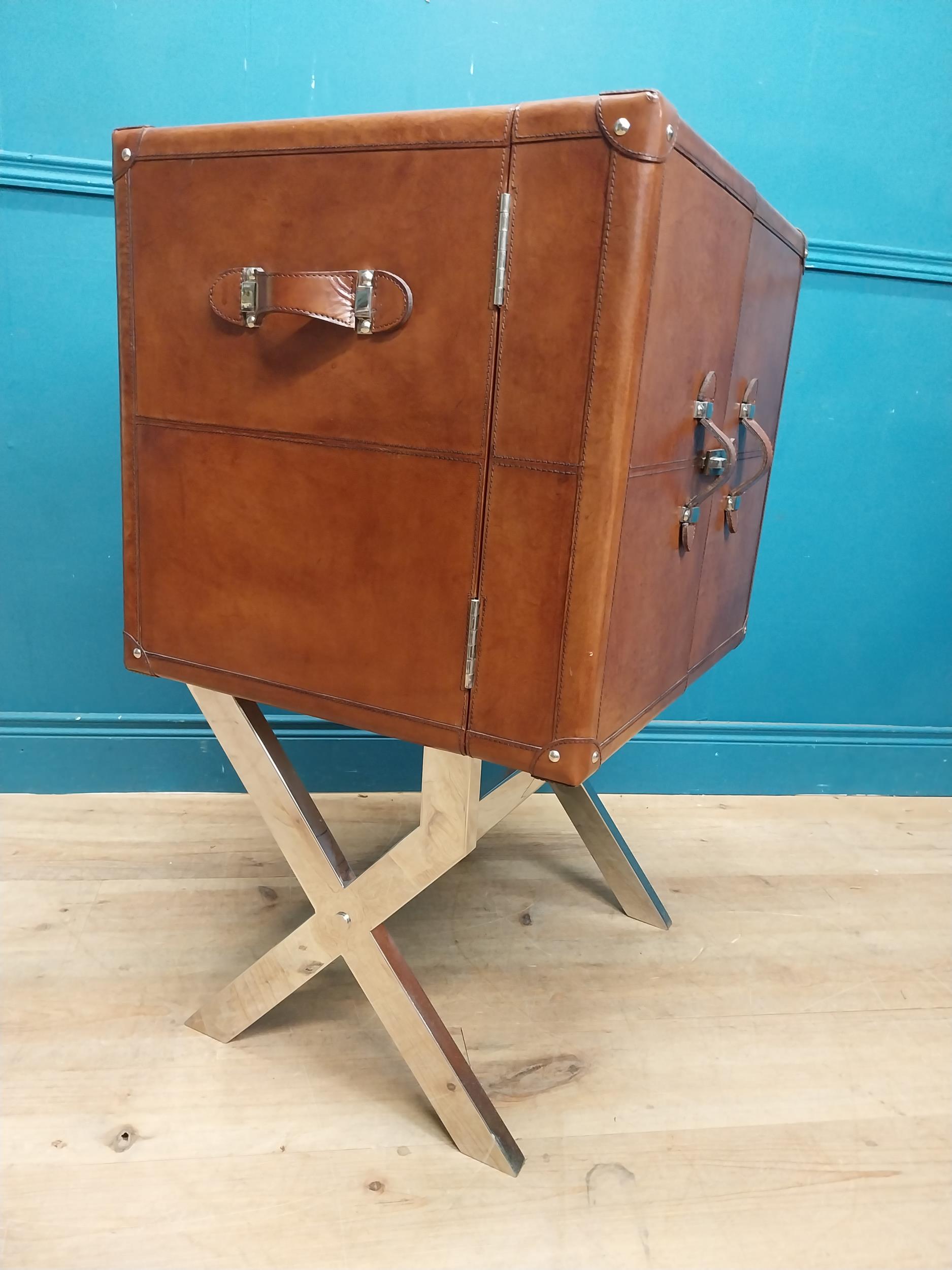 Leather and chrome bar the two doors enclosing shelves pigeon holes and a drawer, raised on X - - Image 7 of 12