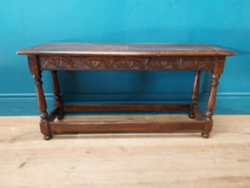 Early 20th C. carved oak window seat raised on turned columns {45 cm H x 90 cm W x 30 cm D}.