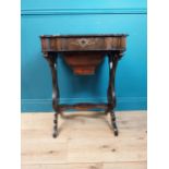 Victorian rosewood sewing table with mother of pearl inlay with fitted interior on shaped carved