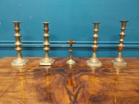 Collection of five early 20th C. brass candlesticks. {29 cm H to 18 cm H}.