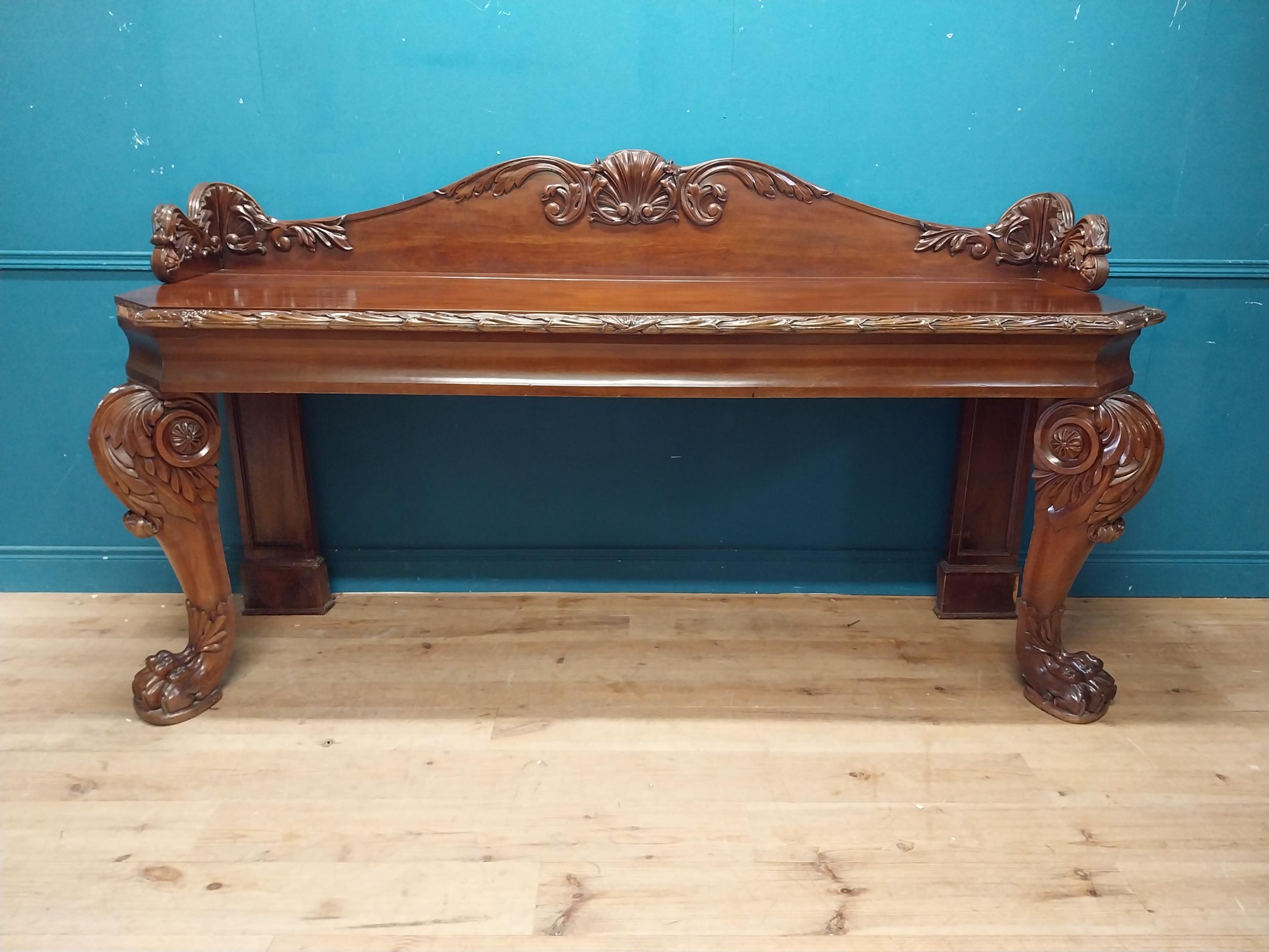 Good quality Irish William IV mahogany server with carved gallery back raised on carved cabriole