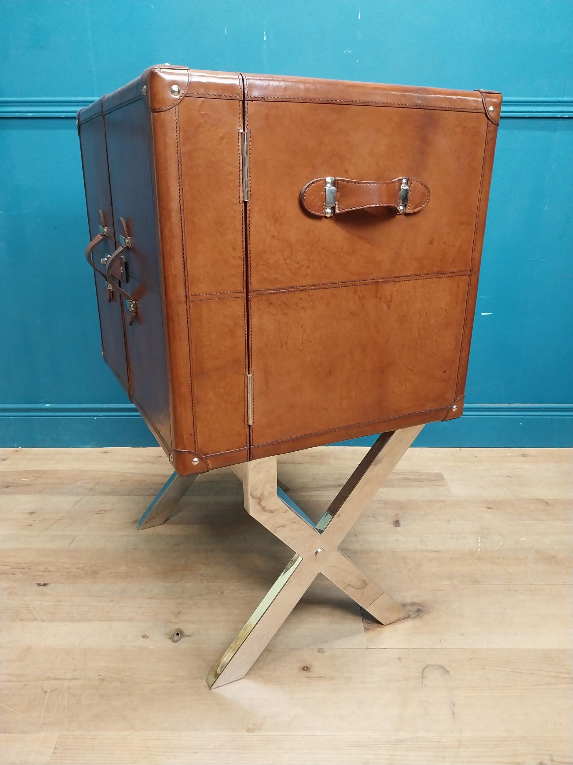 Leather and chrome bar the two doors enclosing shelves pigeon holes and a drawer, raised on X - - Image 9 of 12