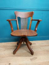 1940's oak swivel open arm office chair. {90 cm H x 65 cm W x 52 cm D}.