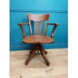 1940's oak swivel open arm office chair. {90 cm H x 65 cm W x 52 cm D}.