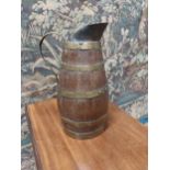 19th C. oak and brass bound water jug {33 cm H x 20 cm Dia.}.
