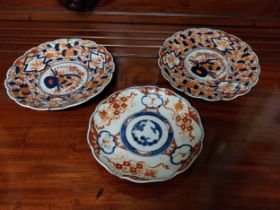 Three 19th C. oriental plates. {25 cm Dia. and 23 cm Dia.}.