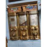 Rare set of three early 20th C. Otto Kind brass coffee dispensers. {80 cm H x 96 cm W x 35 cm D}.