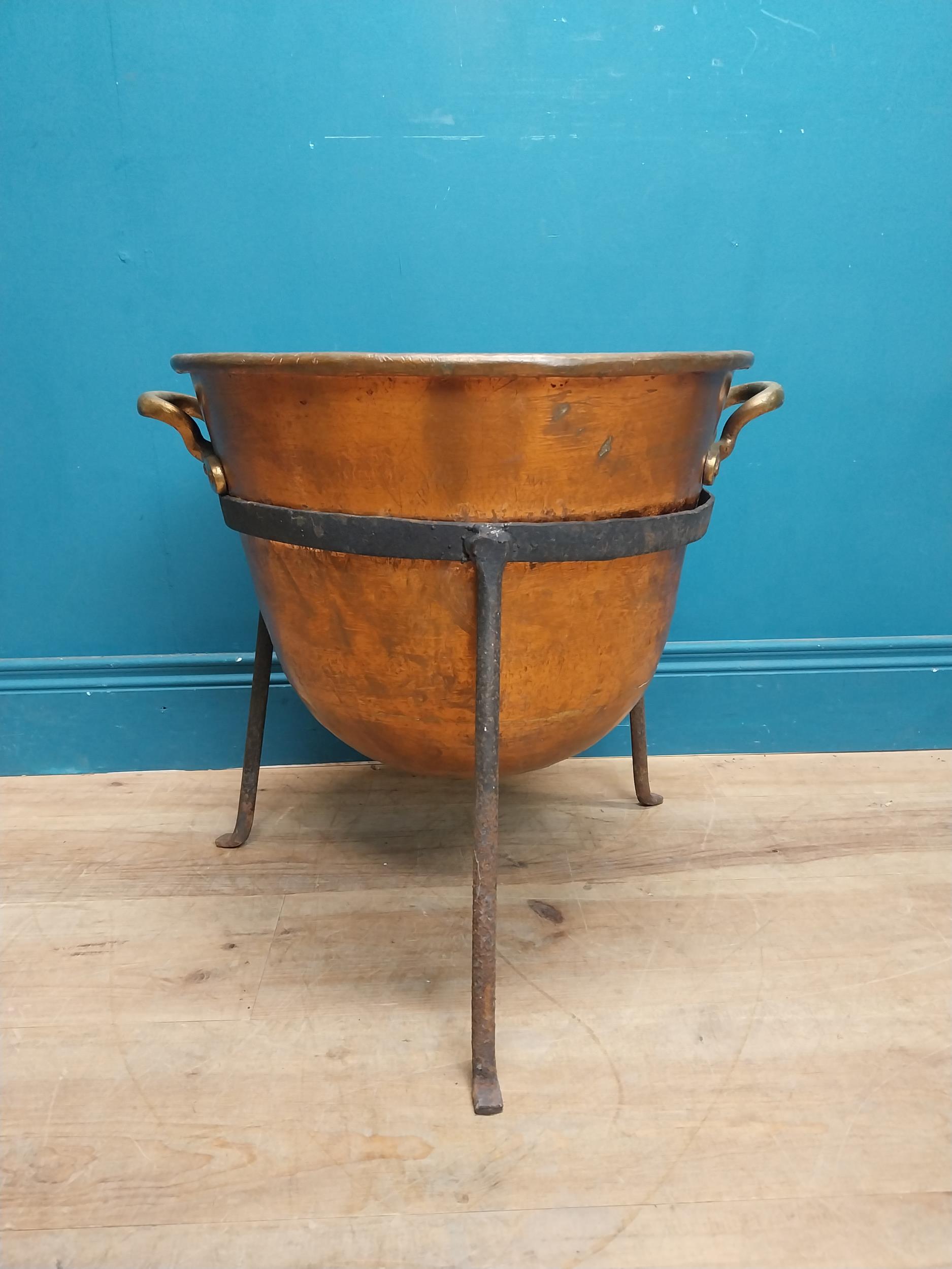 Early 20th C. copper and metal log bucket with two handles on tripod base. {} - Image 4 of 4