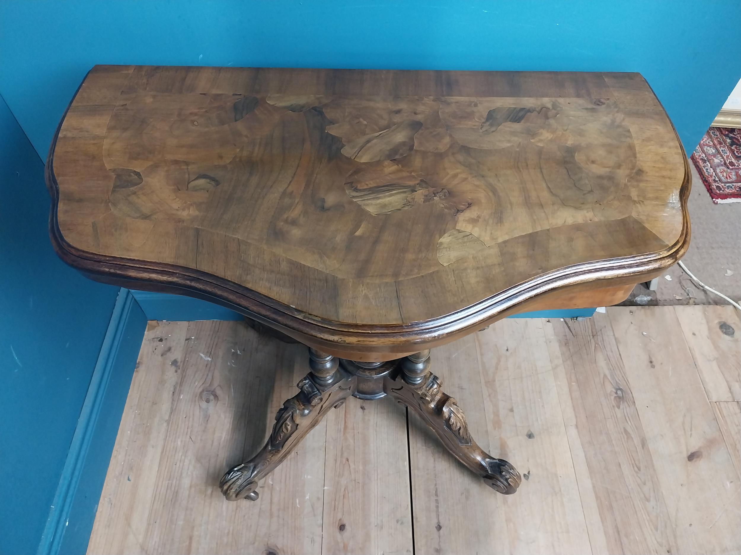 19th C. walnut turn over leaf card table raised on turned columns, four carved outwept feet and - Image 3 of 5