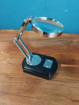 Silver plate desk magnifying glass {16 cm H x 14 cm W x 8 cm D}.