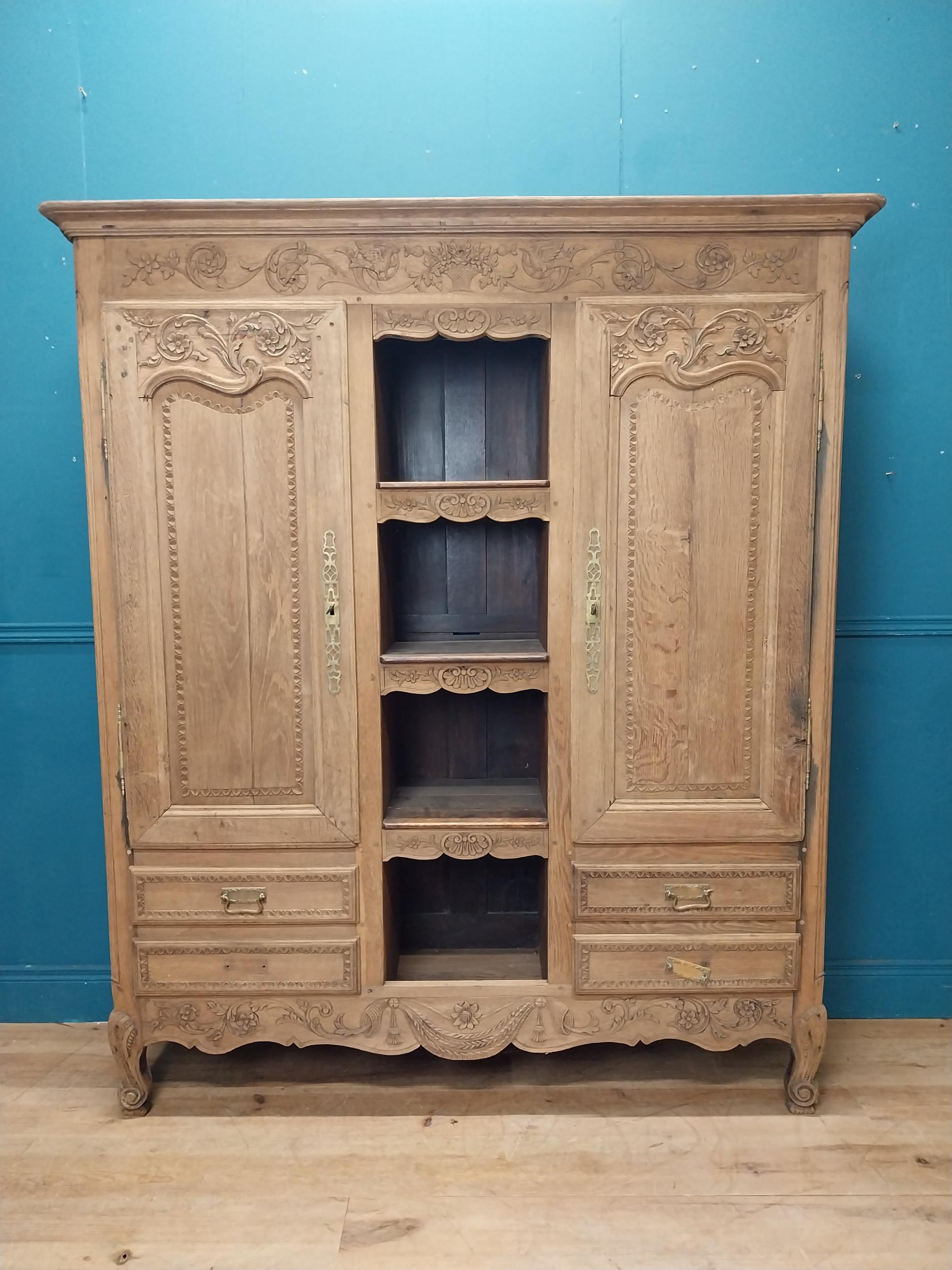 19th C. bleached oak kitchen cabinet with four open shelves in middle surrounded by two short