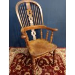 Windsor armchair with saddle seat {H 112cm x W 68cm x D 40cm}.