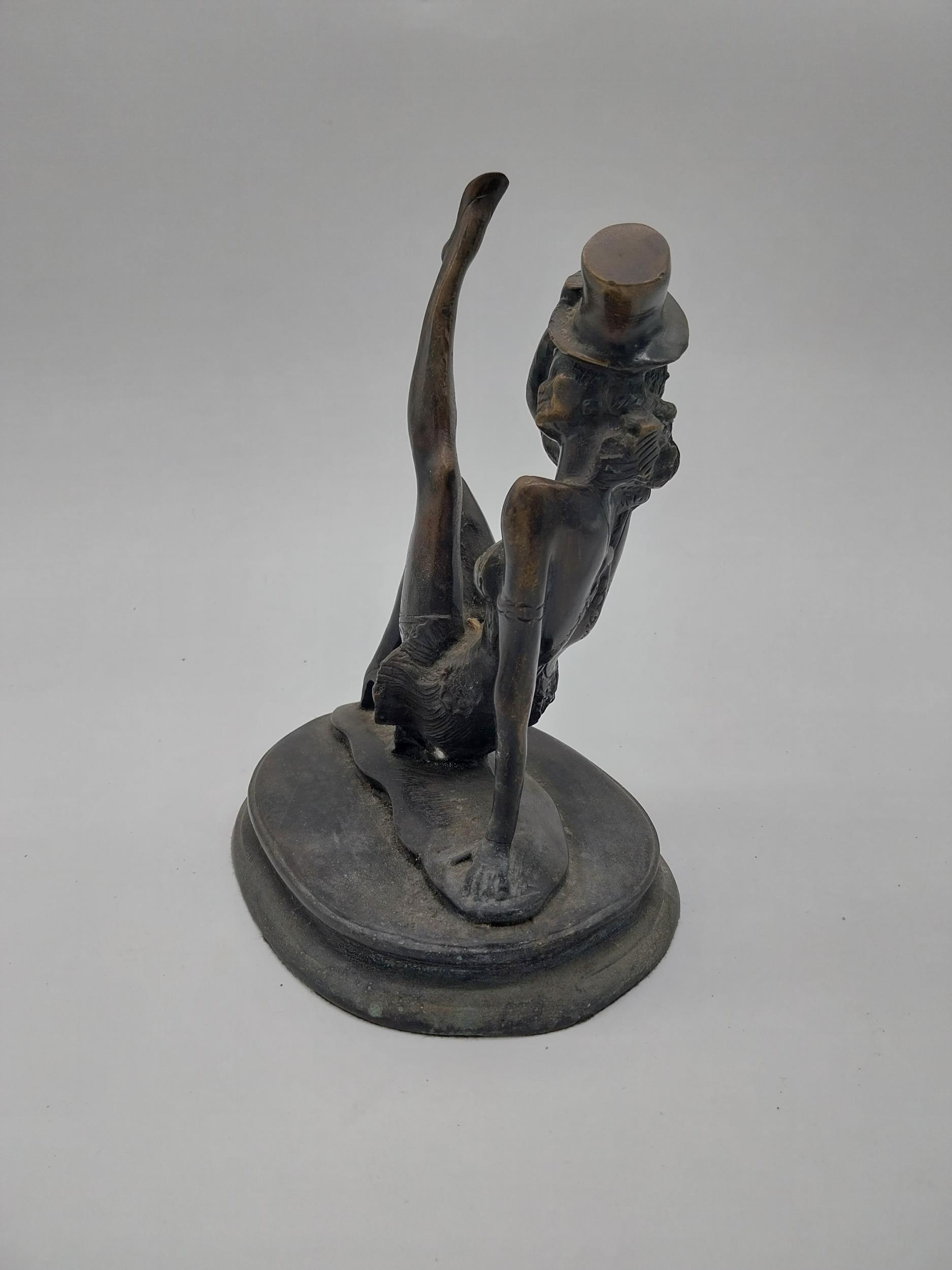 Bronze model of a Dancer with Top Hat. {23 cm H x 19 cm W x 14 cm D}. - Image 2 of 4