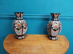 Pair of decorative ceramic vases {30 cm H x 16 cm Dia.}.