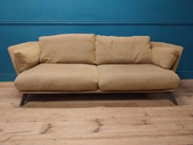Arketipo Nordic fabric upholstered designer sofa raised on splayed feet. {69 cm H x 222 cm W x 92 cm