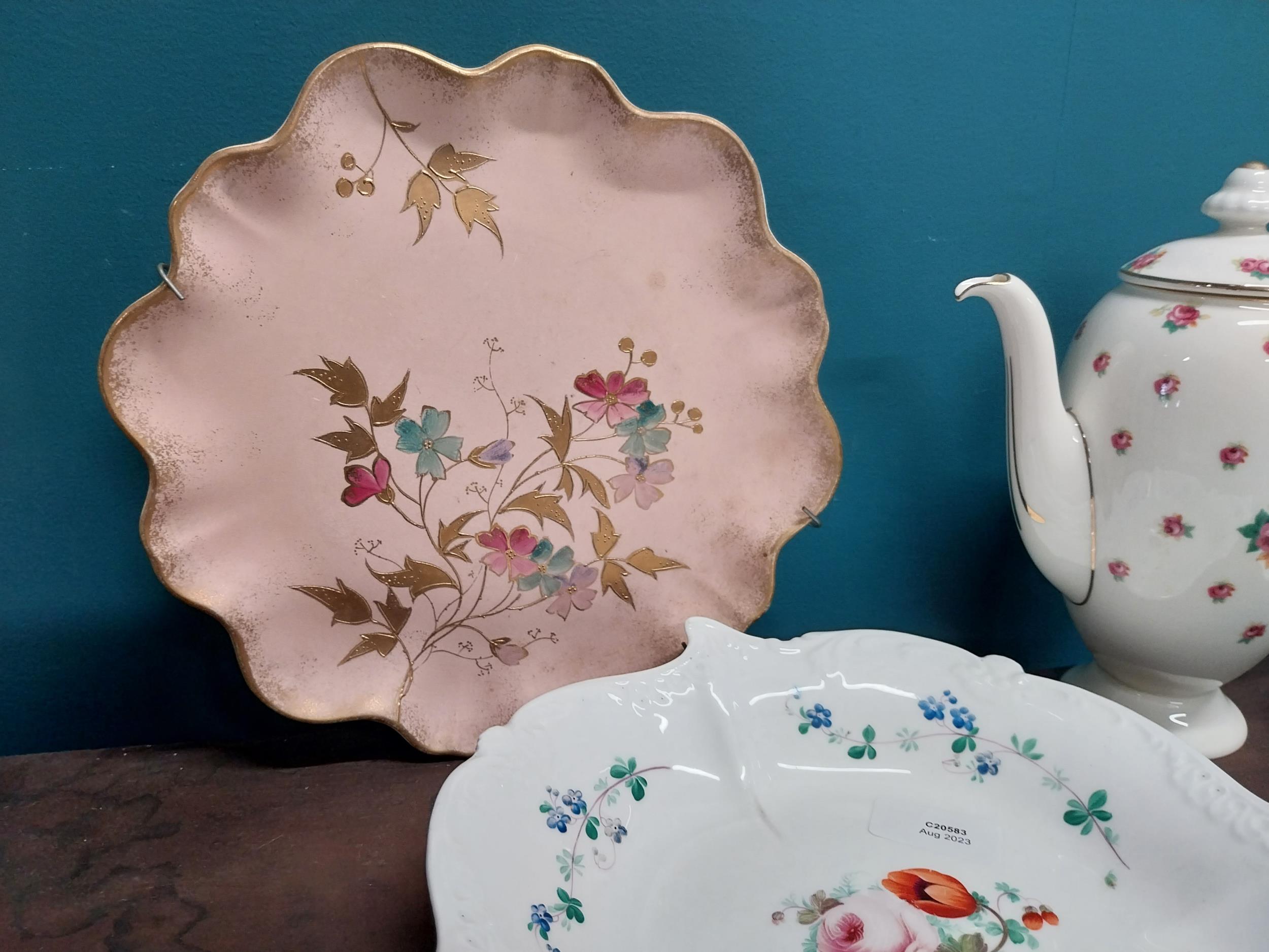 Four early 20th C. hand painted ceramic plates and teapot. - Image 3 of 4