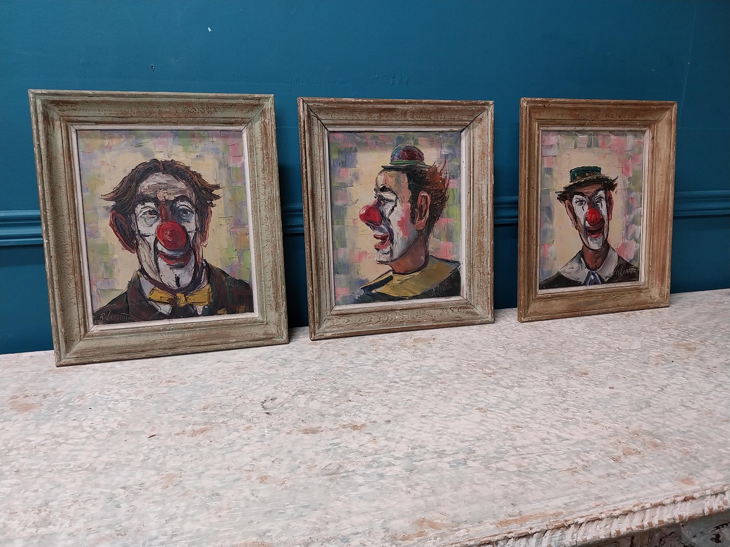 Set of three early 20th C. Clown oil on boards mounted in wooden frames {35 cm H x 30 cm W}. - Image 2 of 8