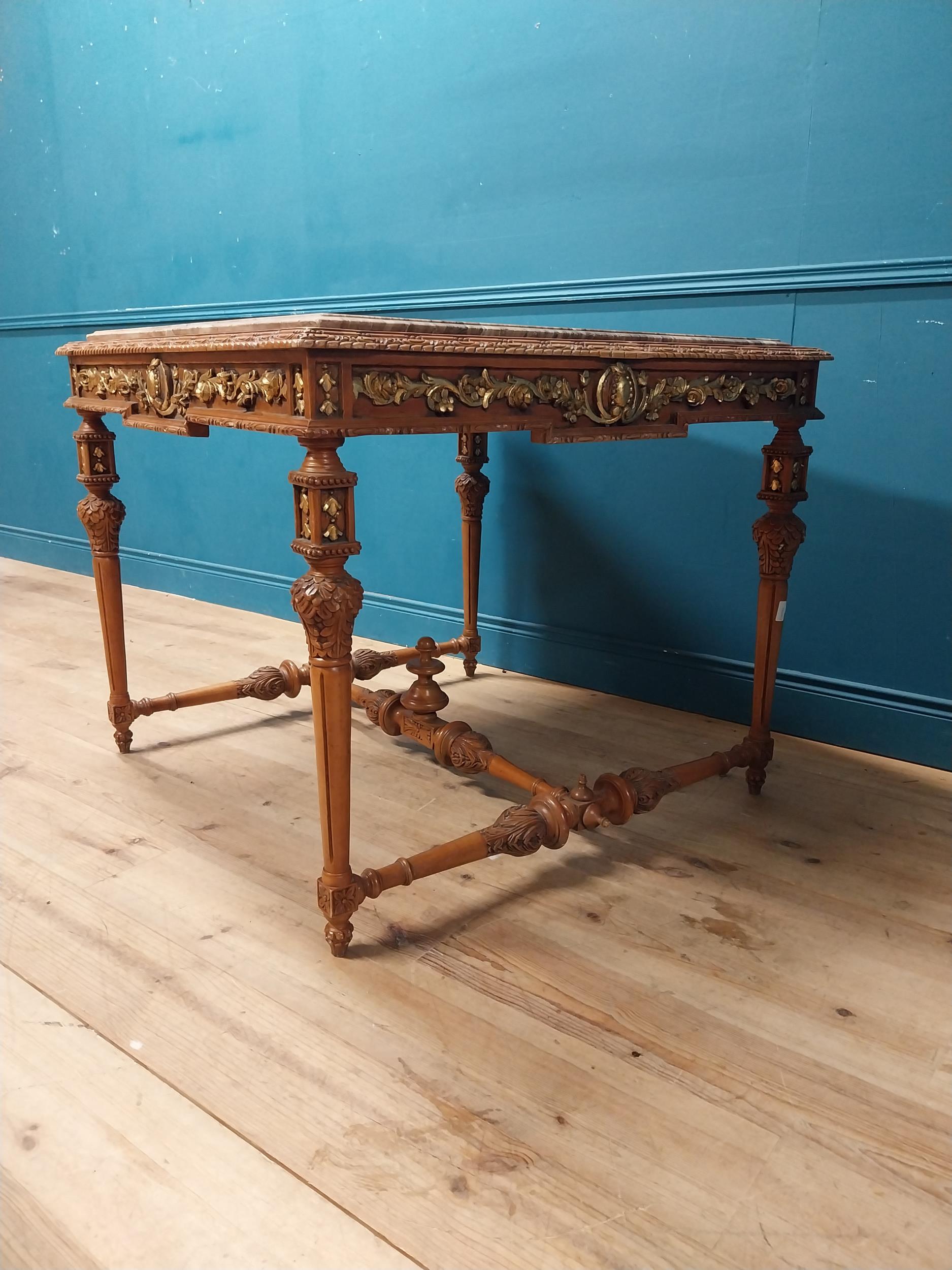 Walnut and partial gilt centre table with marble top raised on carved turned legs {87 cm H x 104 - Image 4 of 9