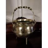 Edwardian brass coal bucket with brass handle raised on three legs {50 cm H x 36 cm Dia.}.