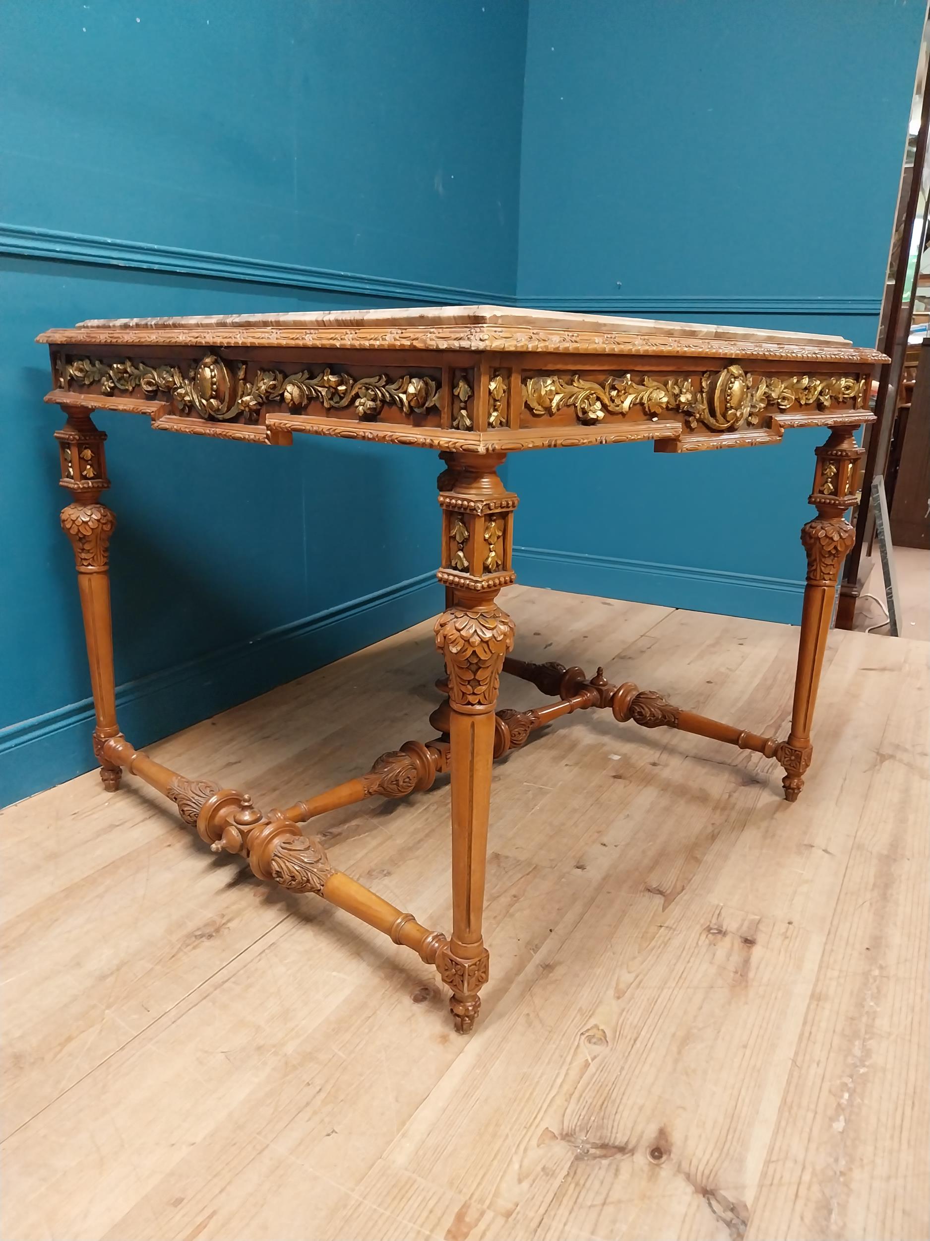 Walnut and partial gilt centre table with marble top raised on carved turned legs {87 cm H x 104 - Image 2 of 9