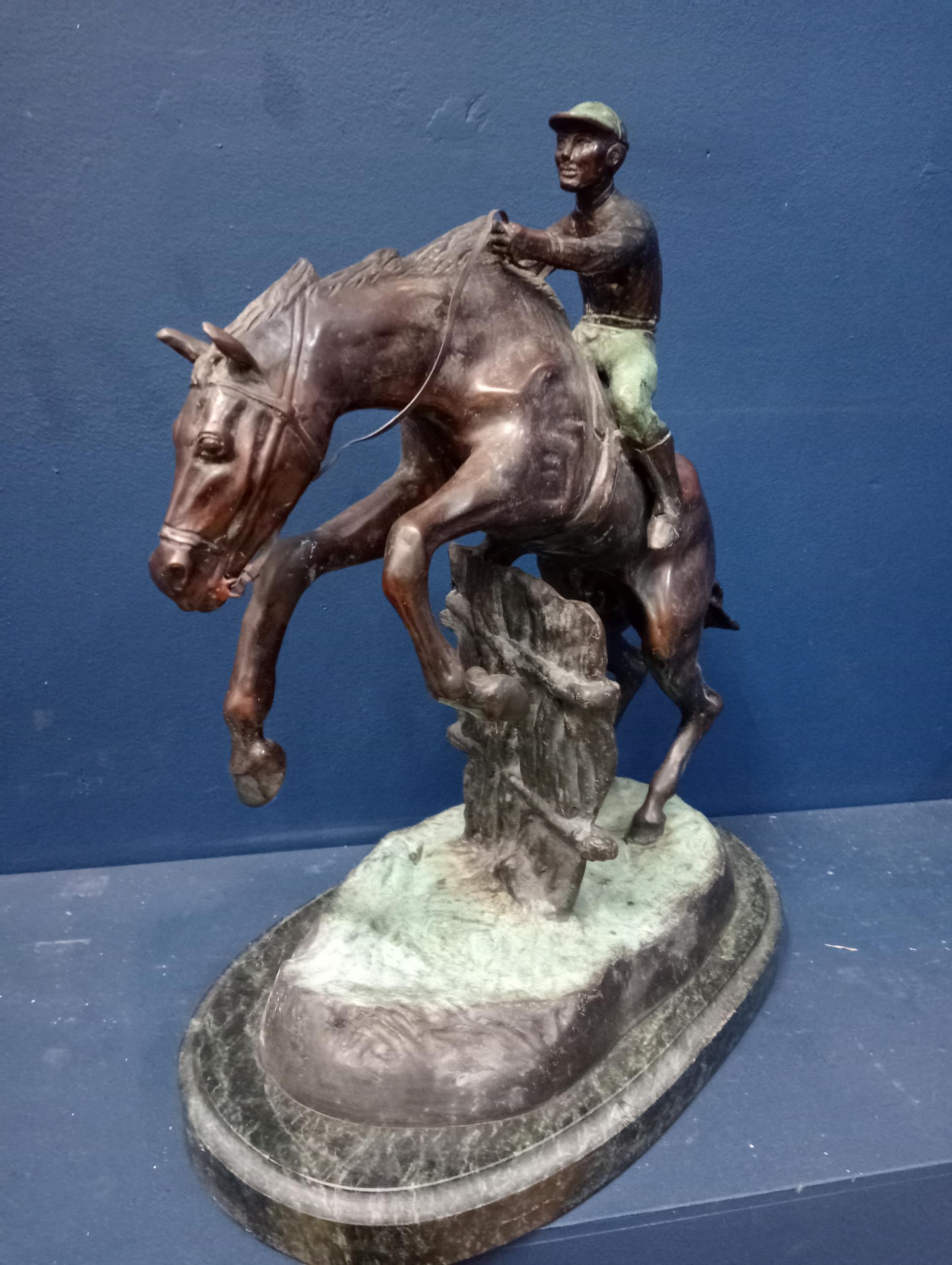 Bronze model of a horse and jockey mounted on marble base {H 43cm x W 36cm x D 22cm }. - Image 3 of 5