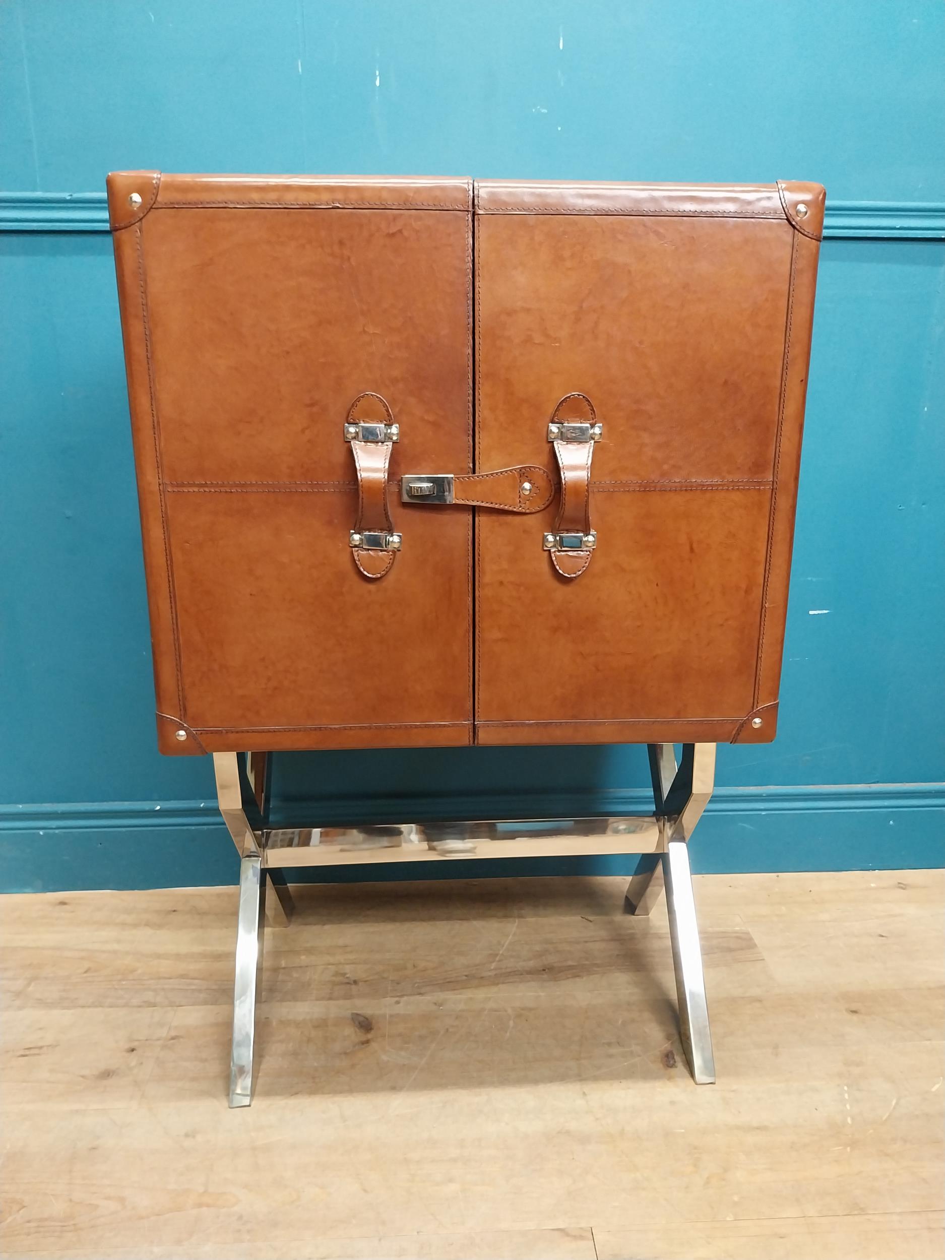 Leather and chrome bar the two doors enclosing shelves pigeon holes and a drawer, raised on X - - Image 11 of 12