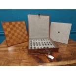 Cased leather chess set.