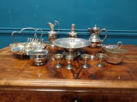 Early 20th C. collection of silver plate including lidded jugs, egg cups and sugar sifter.