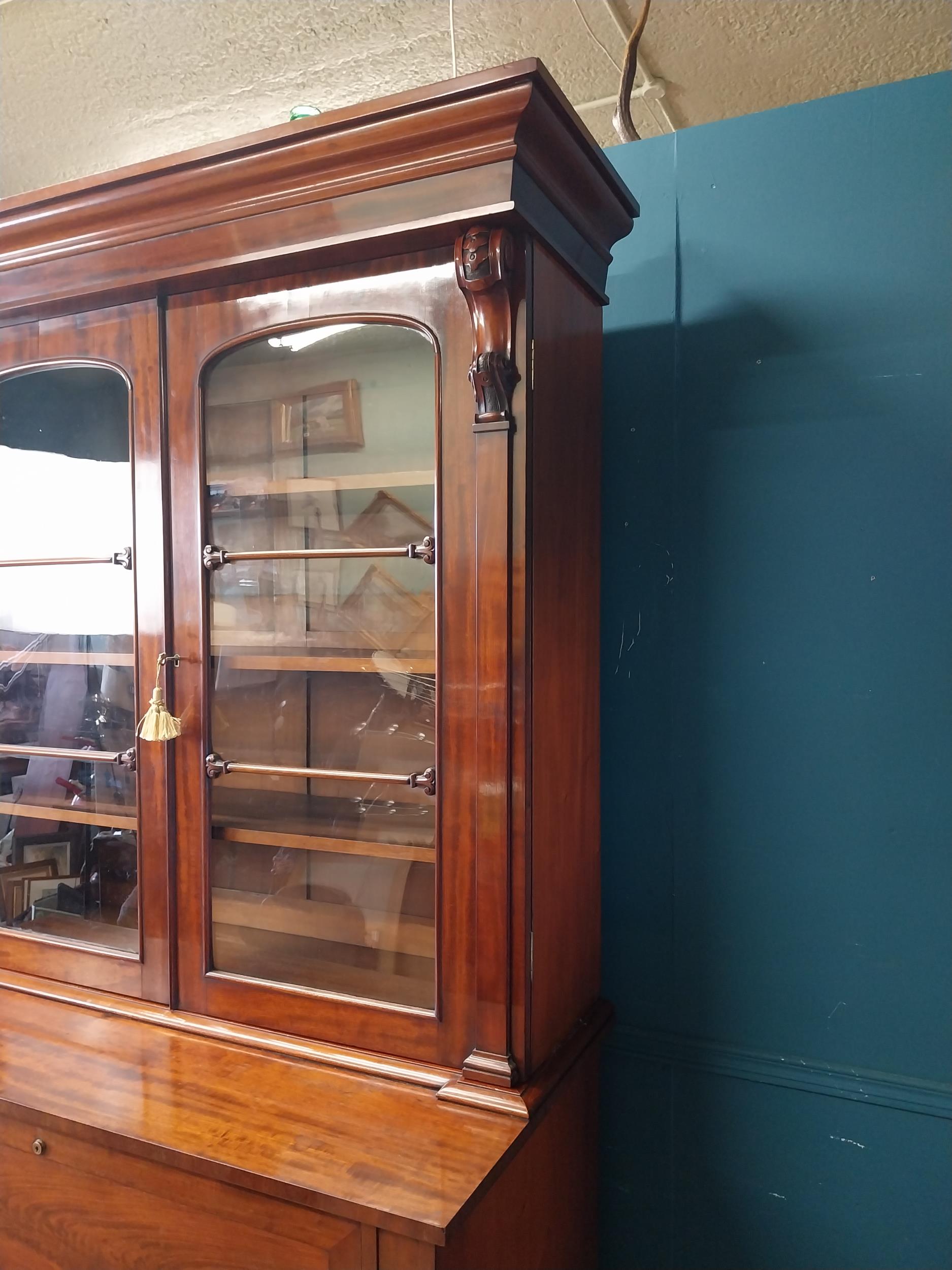 19th C. mahogany bureau bookcase with two glazed doors and fitted interior over two blind doors {231 - Image 7 of 11