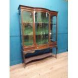 Edwardian mahogany glazed display cabinet with single drawer in frieze raised on cabriole legs. {177