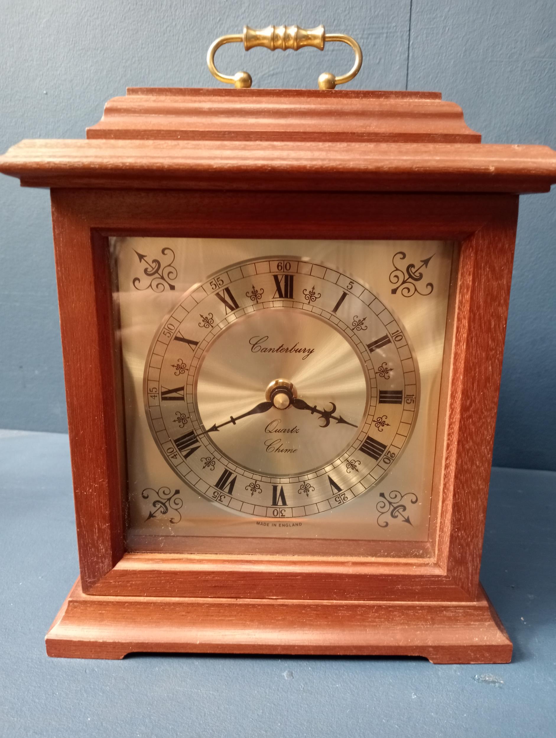 Mahogany carriage clock quartz chime {H 23cm x W 19cm x D 13cm }.