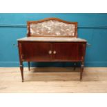 Edwardian mahogany wash stand with marble top and marble gallery back with two blind doors raised on