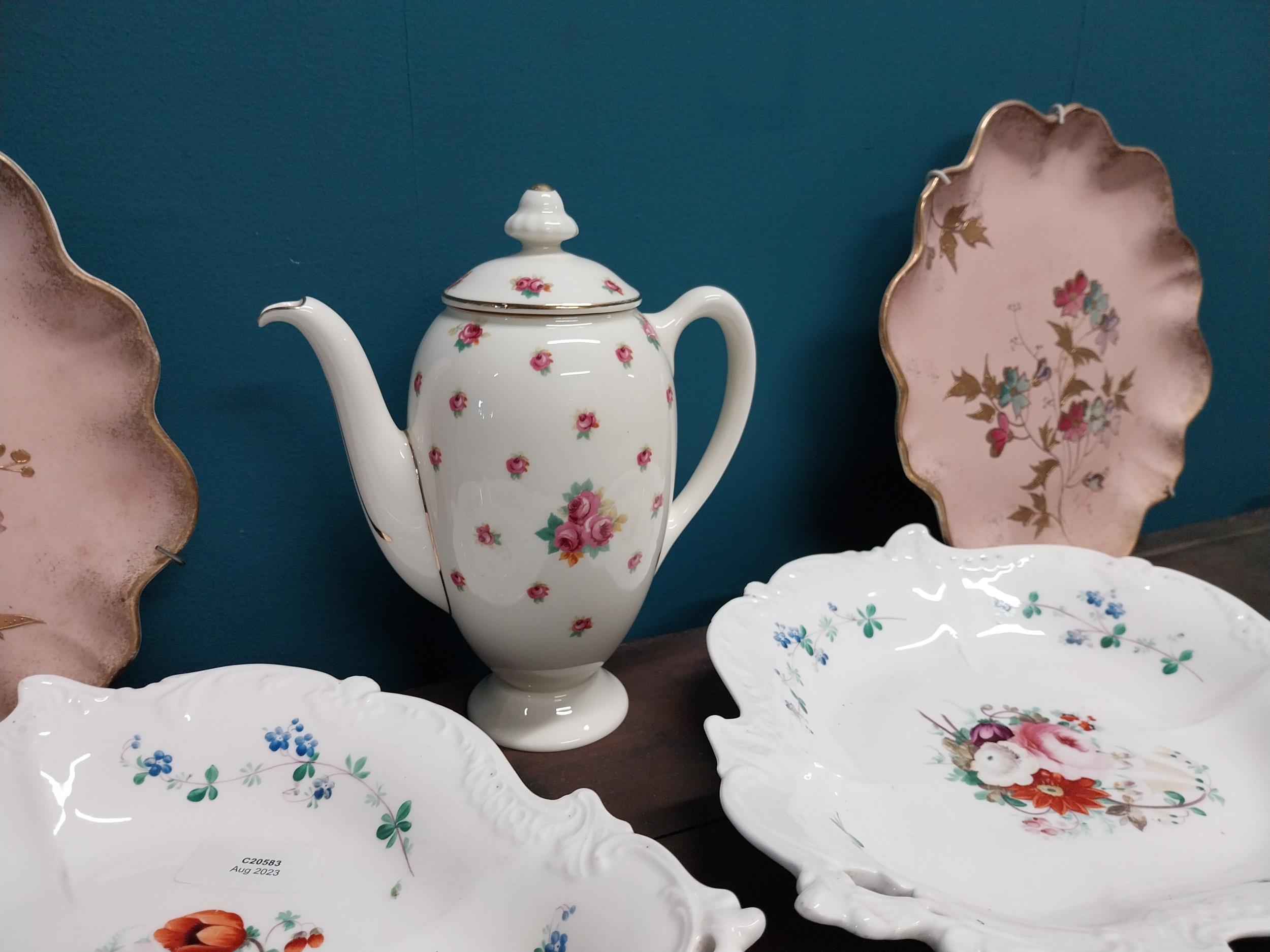 Four early 20th C. hand painted ceramic plates and teapot. - Image 4 of 4