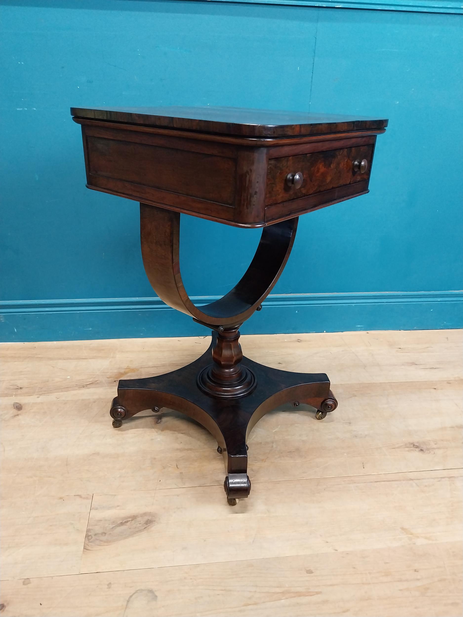 William IV rosewood lamp table with single drawer in frieze raised on bow shaped support on platform - Image 6 of 8