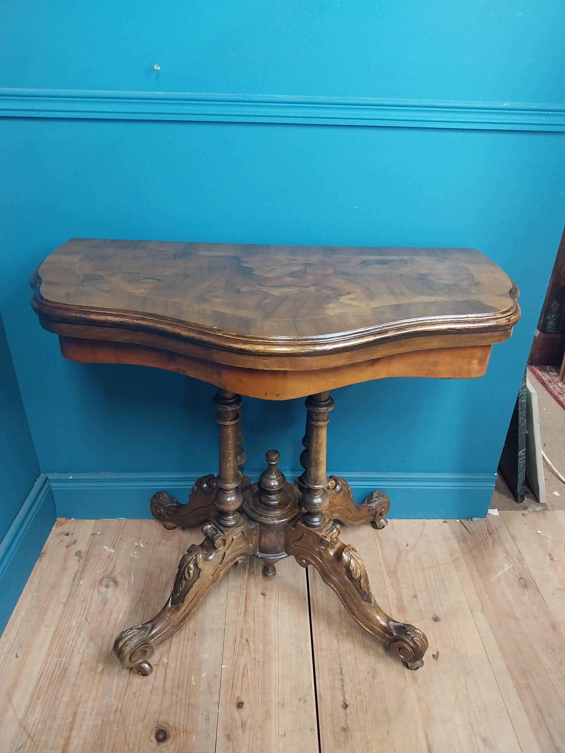 19th C. walnut turn over leaf card table raised on turned columns, four carved outwept feet and - Image 2 of 5