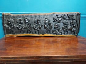 African carved hardwood plaque {27 cm H x 87 cm W}.