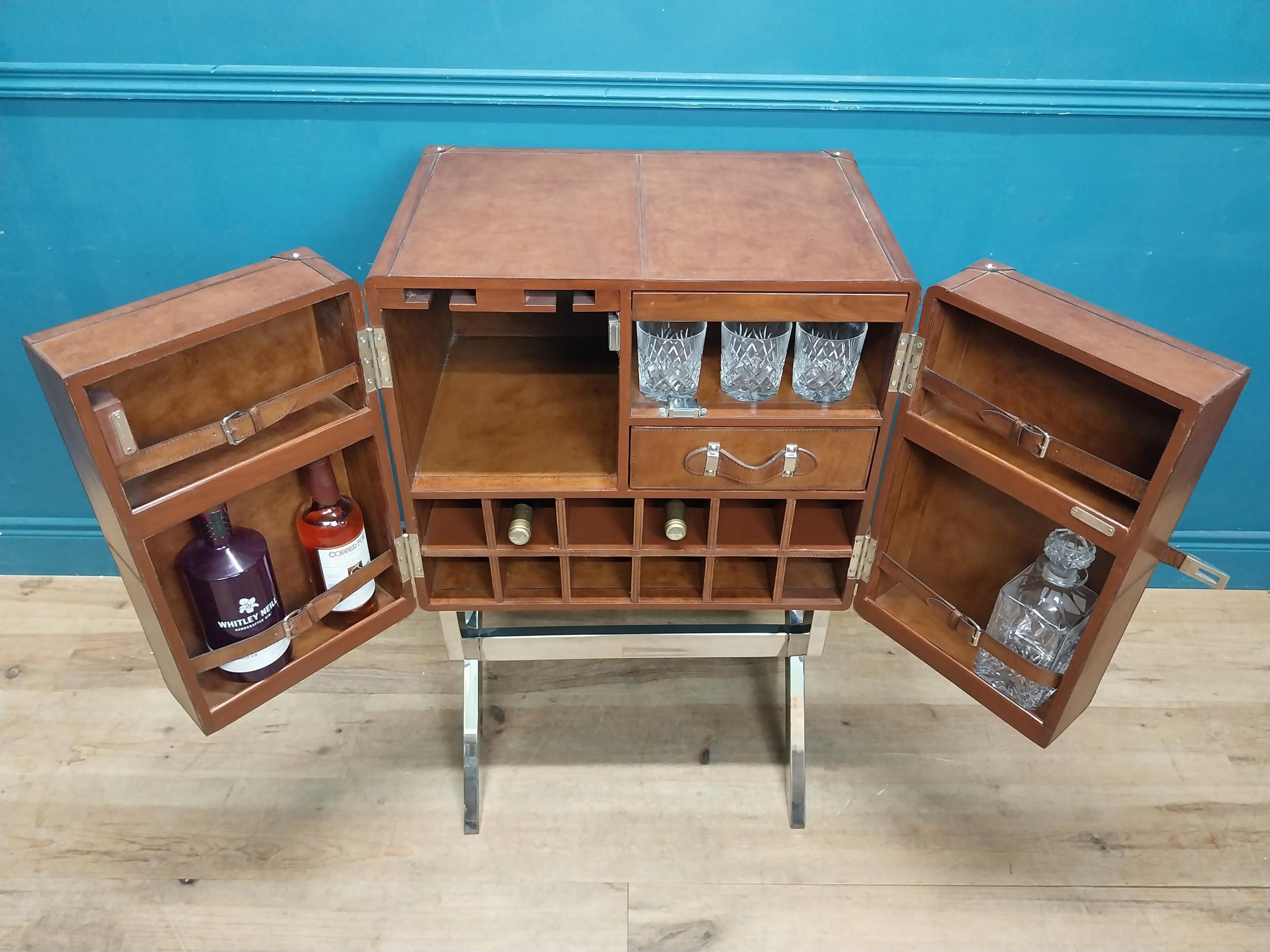 Leather and chrome bar the two doors enclosing shelves pigeon holes and a drawer, raised on X - - Image 3 of 12