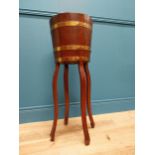 Edwardian oak and brass bound jardiniere {80 cm H x 30 cm Dia.}.