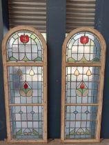 Pair of reclaimed arch topped stained glass windows {Each H 191cm x W 67cm x D 9cm}.