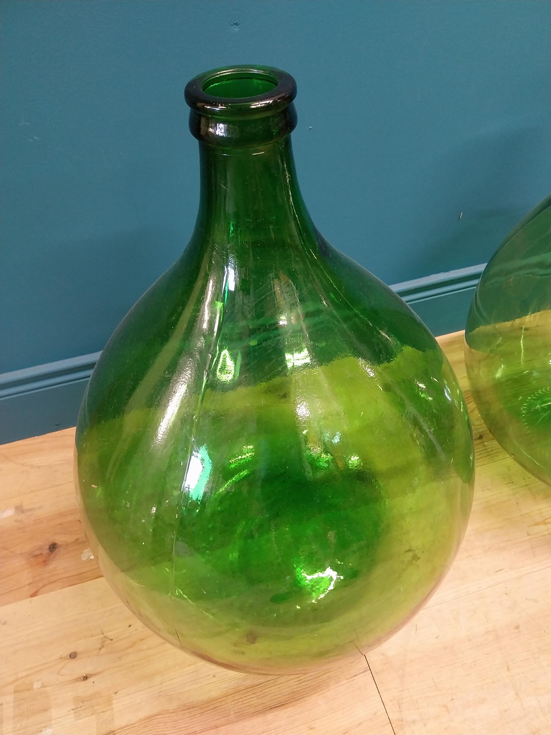 Pair of 19th C. green carboy glass bottles. {70 cm H x 43 cm Dia.}. - Image 2 of 3