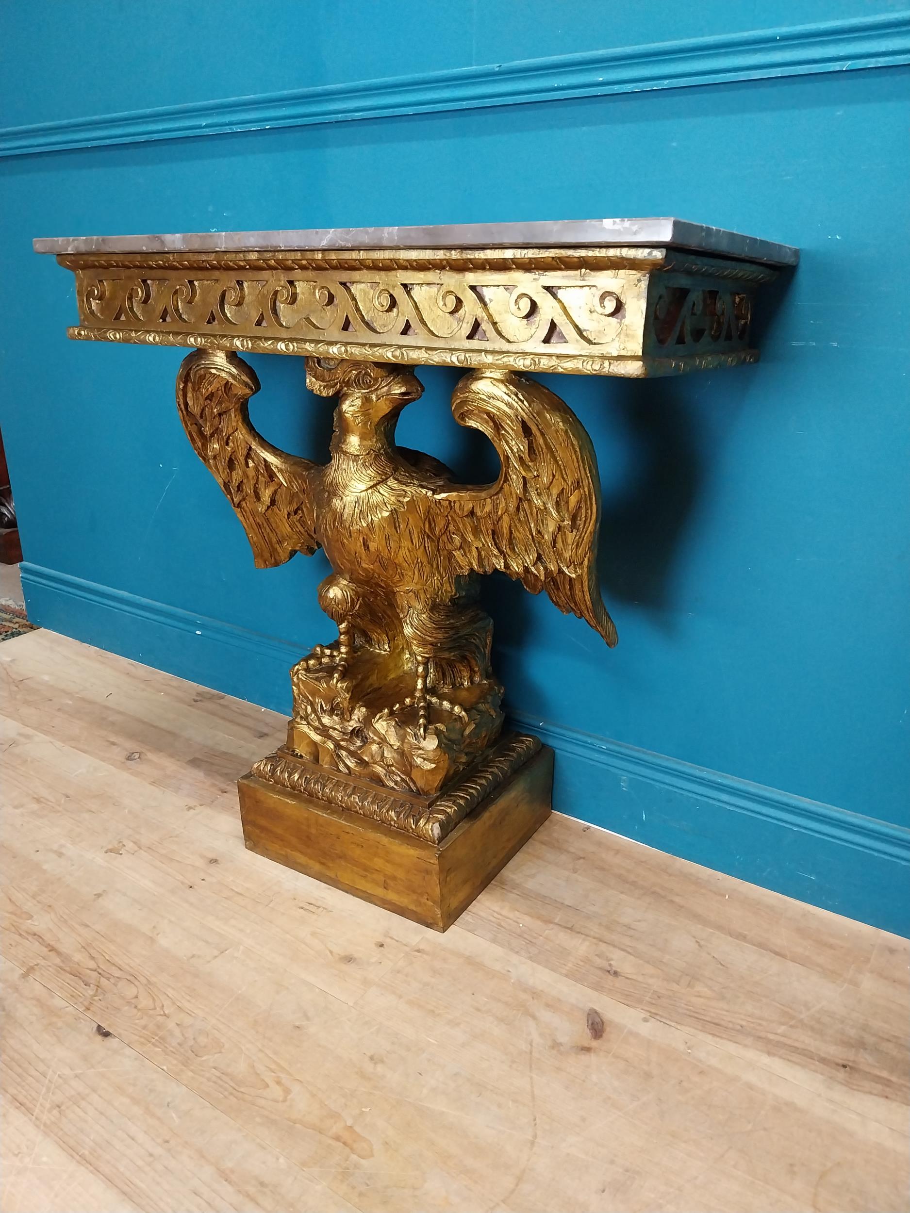 Pair of gilt cast metal marble topped console tables with outspread eagles on base in the William - Image 5 of 8