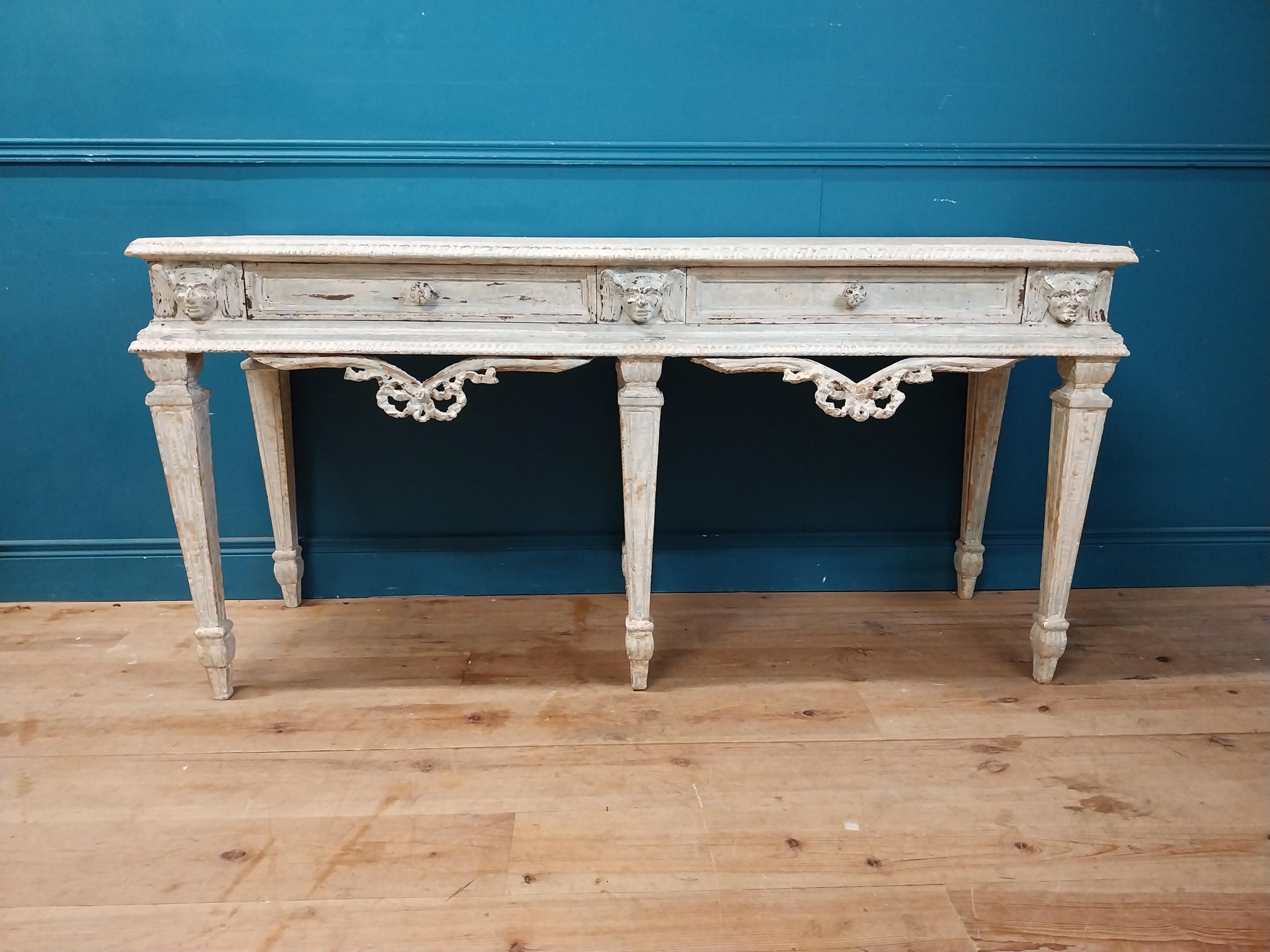 Good quality French painted pine console table with two drawers in the frieze raised on square