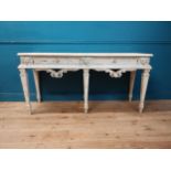 Good quality French painted pine console table with two drawers in the frieze raised on square