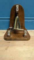 Fusilers Enniskillen brass gong with striker {26 cm H x 22 cm W x 19 cm D}.